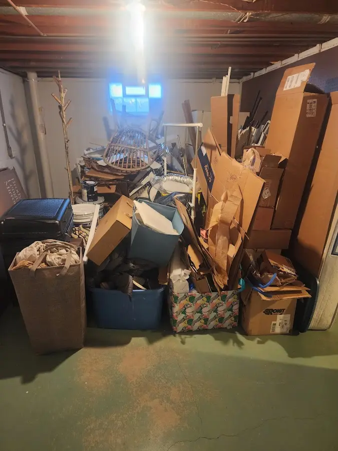 Roll-off dumpster container at job site for Yard Waste Dumpster Rental in West Fargo